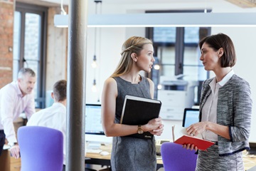 Two women talking to each other